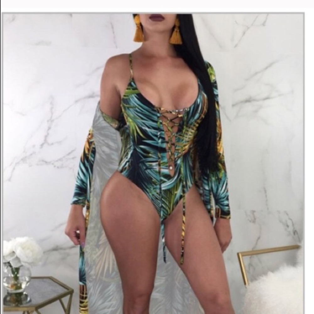 Bathing suit with matching Coverup. Brand New.